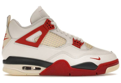 White and red sneaker with black accents on a white background